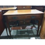 19th century walnut single drawer side table on square section tapering supports to castors, 91.