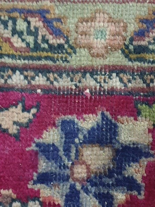 Modern antique Indian pattern carpet with central cream and blue ground stepped medallions on a pink - Image 3 of 3