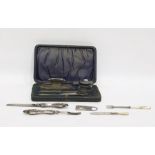 Silver backed lady's manicure set comprising nail buffer, scissors, silver-capped jar, etc, in a