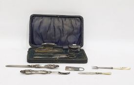 Silver backed lady's manicure set comprising nail buffer, scissors, silver-capped jar, etc, in a