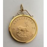 1974 gold Krugerrand in pendant mount with scroll surmount  Condition ReportThe weight is approx