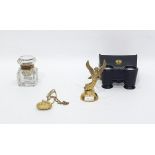 A pair of Negretti & Zambra field glasses, cased, a gilt-metal pendant formed as a purse, a figure