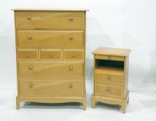 Beech effect chest of seven assorted drawers and matching  bedside chest (2)