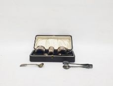 George V silver cruet set comprising open salt, pepper pot and mustard pot with hinged cover, two