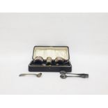 George V silver cruet set comprising open salt, pepper pot and mustard pot with hinged cover, two