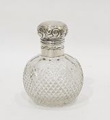 Silver-topped cut glass scent bottle of globular form, London 1898, 10cm high