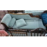 19th century mahogany chaise longue in a light blue ground upholstery, turned supports