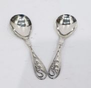 Pair Danish silver spoons with foliate and pierced handles, hammered bowls, possibly Georg Jensen (