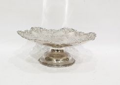 Silver fruit dish with pierced vine leaf decoration, on a raised circular foot, Sheffield 1928, 28cm