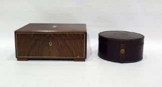 Early 20th century walnut humidor and a brown leather circular case