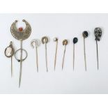 Quantity of stickpins to include onyx and enamel