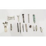 Quantity of silver pencils, various, a silver belt buckle, four knives, a fairy bookmark, two