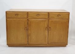 Modern light elm Ercol sideboard of three doors above three cupboards doors 155 x 94 cmsCondition