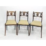 Set of four Regency simulated roseewood dining chairs with anthemion and scroll carved backs, gold
