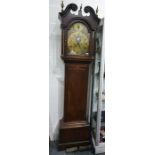 George III oak longcase clock by Henry Bunyan, Lincoln, the hood with swan neck pediment, flowerhead