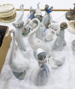17 various Lladro figures and models including models of geese, a girl carrying a cake, another with