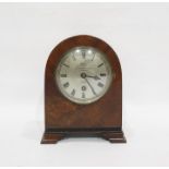 Dent burrwood round arch mantel clock having circular steel dial with Roman numerals, all having