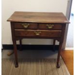 18th century oak lowboy, the rectangular top with moulded edge above two short and one long