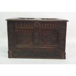 Possibly 18th century oak coffer with applied moulded decoration to the top, carved to twin panels