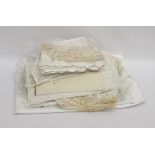 A quantity of linen, to include embroidered place mats, napkins and table cloths and crocheted place