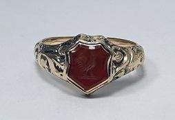 Antique gold seal ring set with shield-shaped cornelian stone with engraved cockerel crest and