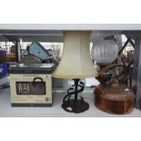 Boxed Martini mixing set in faux-leather case, a copper kettle, two lamps and an extra oil lamp