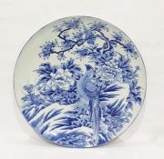 Asian porcelain blue and white large charger, possibly Japanese, blue character mark, painted with a