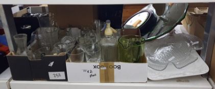 Two boxes of mixed glassware including jugs, green stemmed hock glasses, vintage soda syphon and a