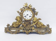 20th century ormolu mantel clock, the drum-shaped case with white enamel dial, inscribed "Martin