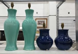 Two pairs of ceramic table lamps, one in royal blue the other in sage green  Condition ReportThe