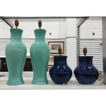 Two pairs of ceramic table lamps, one in royal blue the other in sage green  Condition ReportThe