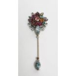 White metal and stone set stickpin brooch, the floral cluster top set with semi-precious stones,