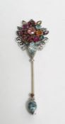 White metal and stone set stickpin brooch, the floral cluster top set with semi-precious stones,