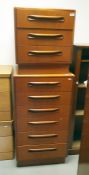 A 20th century bedside chest of three drawers in teak raised upon plinth base and matching narrow