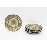 Set of five Asian porcelain dessert plates each with fluted borders celadon ground decorated in gilt