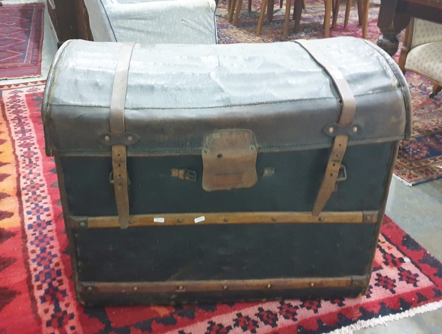 Leather covered wicker dome topped trunk