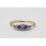 18ct gold, sapphire and diamond ring set two square sapphires surrounded by four small diamonds