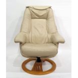 A cream leather easy chair