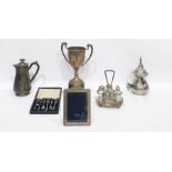 Quantity of silver plate to include a two-handled trophy, a cistern and cover and burner, a large