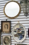 Circular wall mirror and an oval plated wall mirror (2)