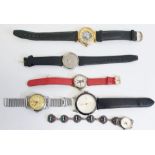 Quantity old wrist watches together with a pedometer