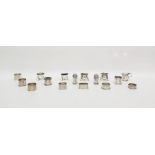 Collection of late 19th/early 20th century silver napkin rings and salt, pepper and mustard pots,