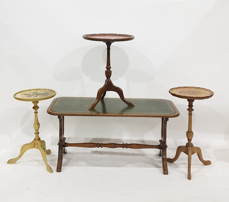 Three reproduction wine tables and a coffee table with leatherette inset top, on lyre supports