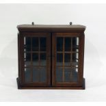 Wall hanging mahogany display cabinet, glazed doors enclosing shelves 50 x 43 cms