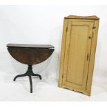 A pine floor standing corner cupboard with single drawer together with oak drop leaf centre table on