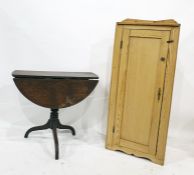 A pine floor standing corner cupboard with single drawer together with oak drop leaf centre table on