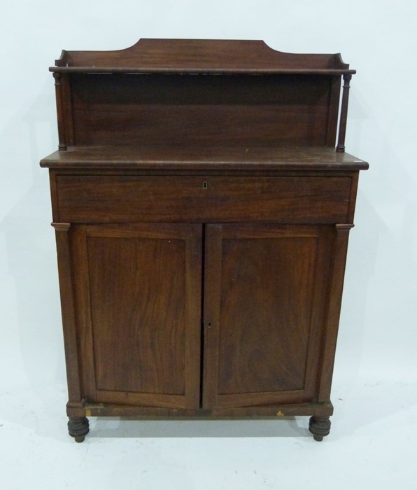 Early Victorian mahogany chiffonier, the raised ledge back with single shelf supported by pair