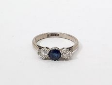 18ct white gold and platinum, sapphire and diamond ring set central circular sapphire flanked by two