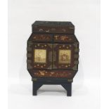 Chinese painted and lacquered miniature cabinet, early 20th century, the hinged double-doors mounted