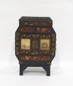 Chinese painted and lacquered miniature cabinet, early 20th century, the hinged double-doors mounted